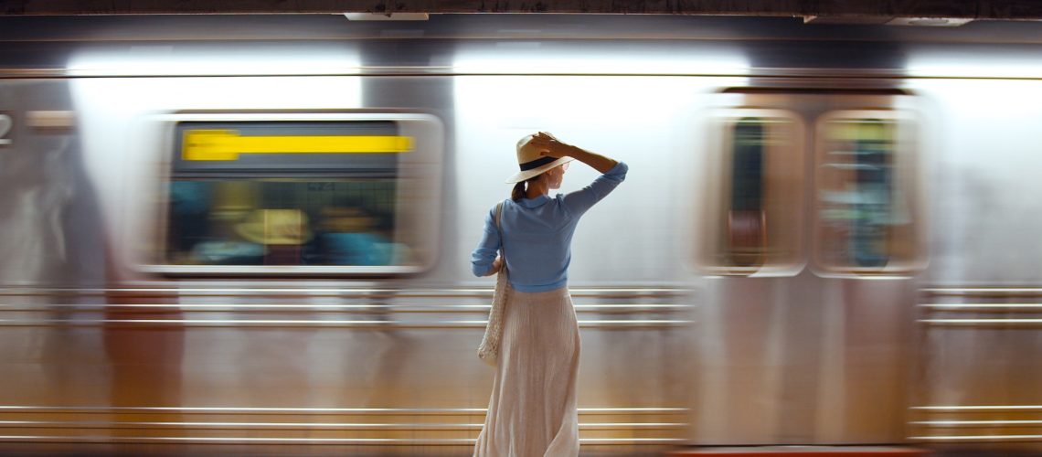 Attractive girl waiting for a train