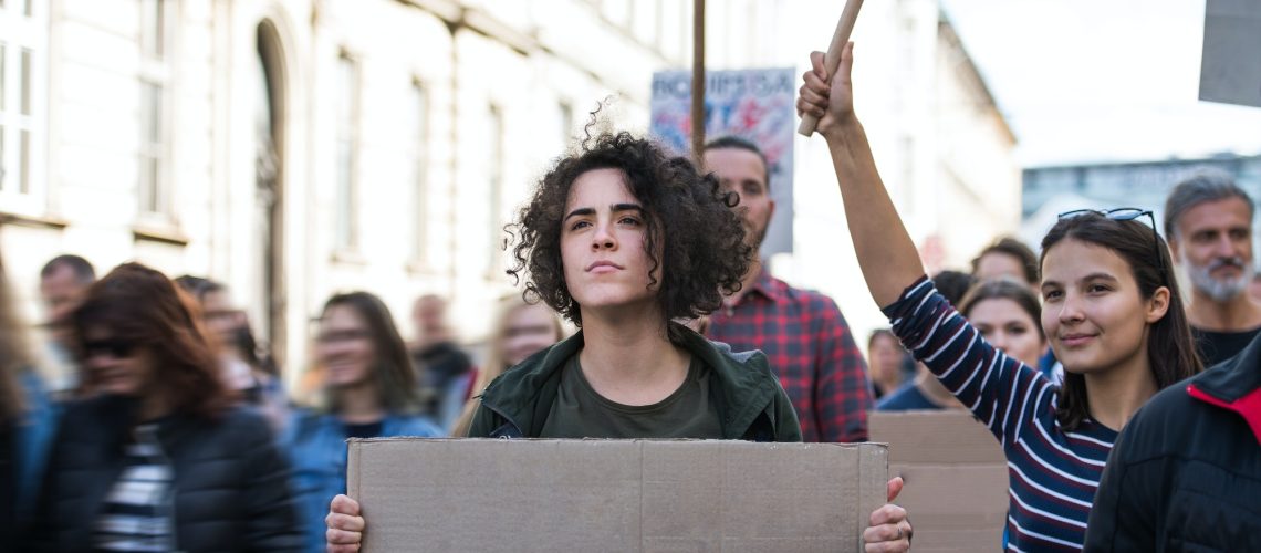 People with placards and posters on global strike for climate change.